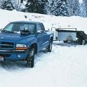 USA ID McCall 2001JAN13 007  Unloading the sleds at the start of the trail head is only the start of the fun.    Take a butchers hook at the icicles on the front of my ute. : 2001, 2001 - 2nd Annual Bed & Sled, Idaho, January, McCall, North America, USA